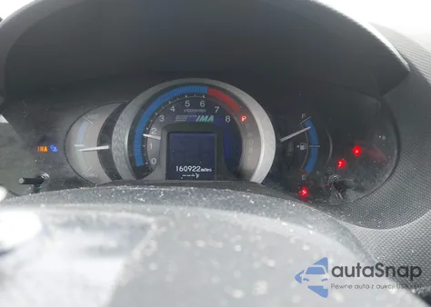 2010 Honda Insight Lx z USA, uszkodzony, nr VIN JHMZE2H5XAS014898